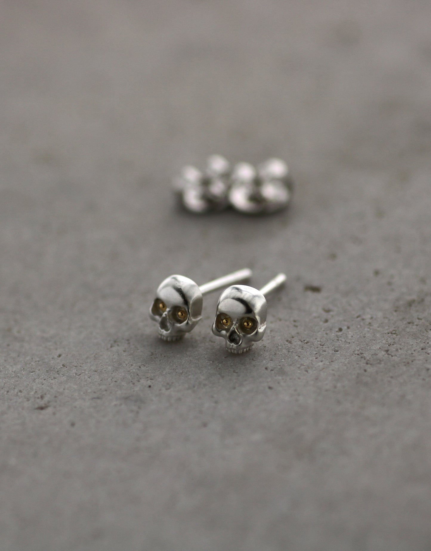 18ct Gold & Sterling Silver Skull Studs by Hugh Thyregod