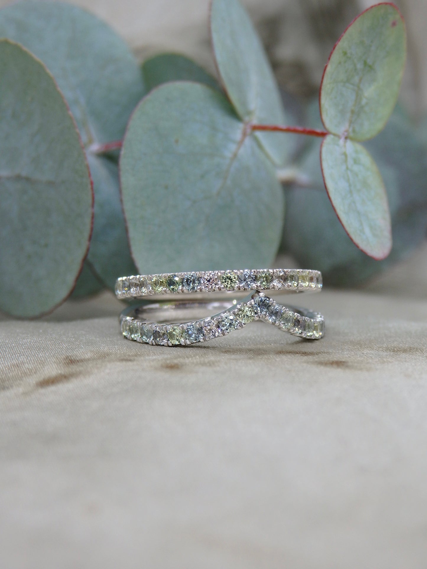 Multi tone pastel green, blue, yellow and white diamond-cut sparkly sapphires micro-pave set in 18ct white gold and platinum fitted wedding band or eternity ring