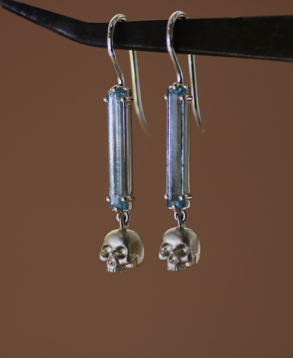 Baguette Aquamarine Skull Drop Earrings by Hugh Thyregod
