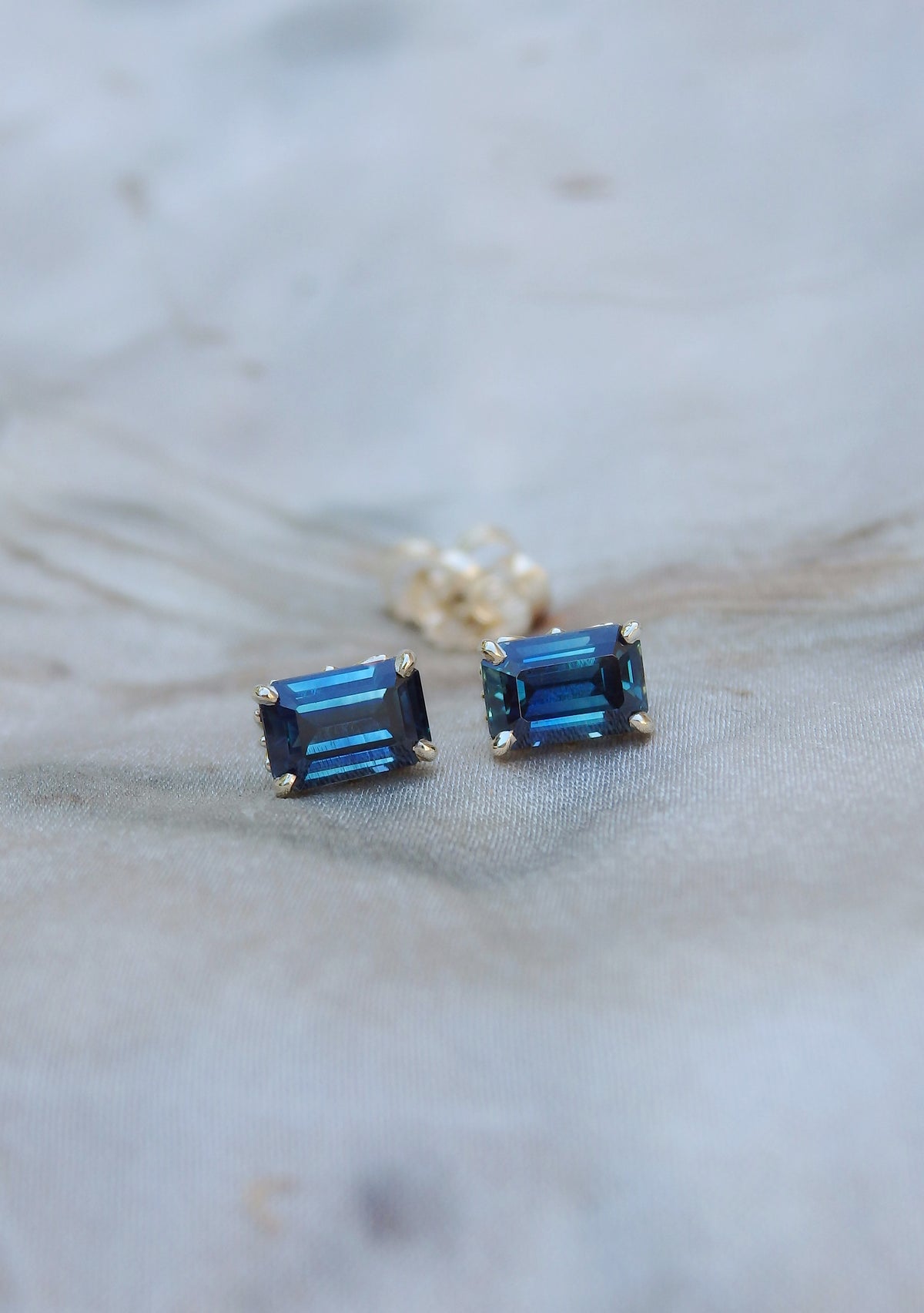 1.44ct Emerald Cut Blue Australian Sapphire Gold Studs - Fleur de lis motif